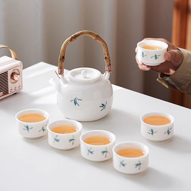 Suet jade hand-painted magnolia flower jacquard pot, ceramic kung fu tea set