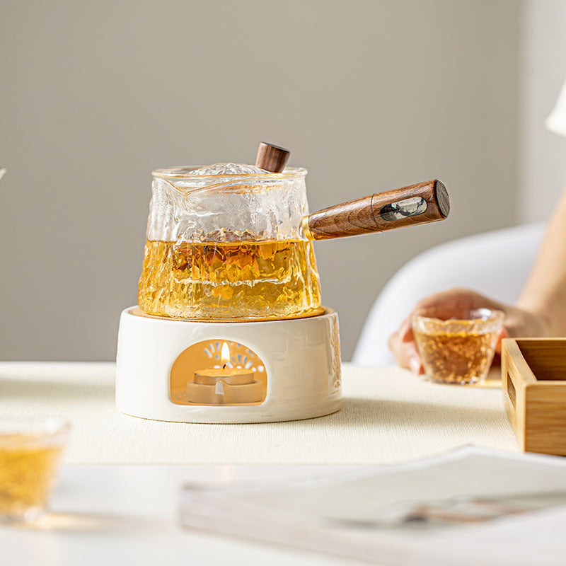 Transparent flower teapot. High temperature resistant restaurant filter glass bubble teapot. Heat-resistant health pot. High-end tea set side handle pot. Candle heating portable set pot